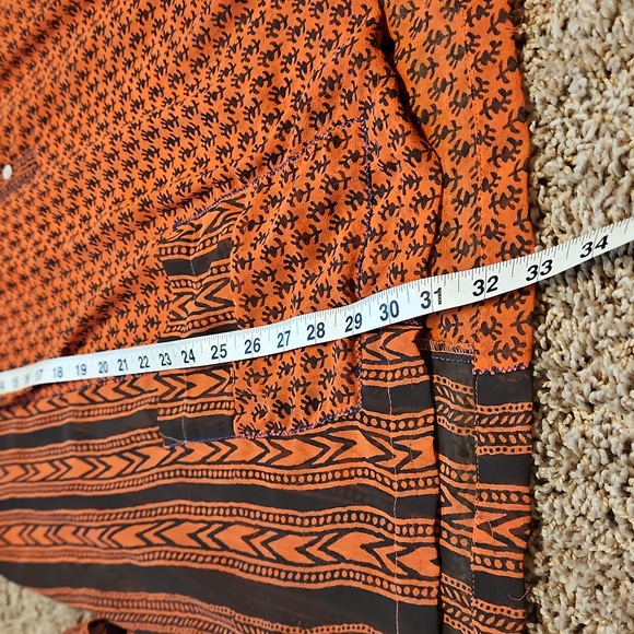 Free People Feather In The Wind Top In Blood Orange - Picture 9 of 9